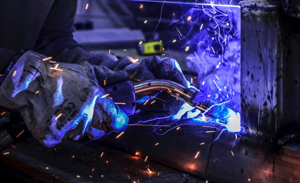A metal fabricator welding